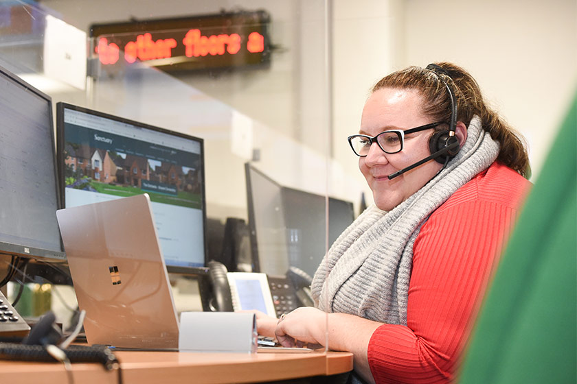 Sanctuary staff member working using a headset