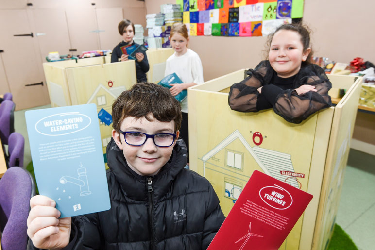 Children enjoying the new learning materials at Blacon Adventure Playground