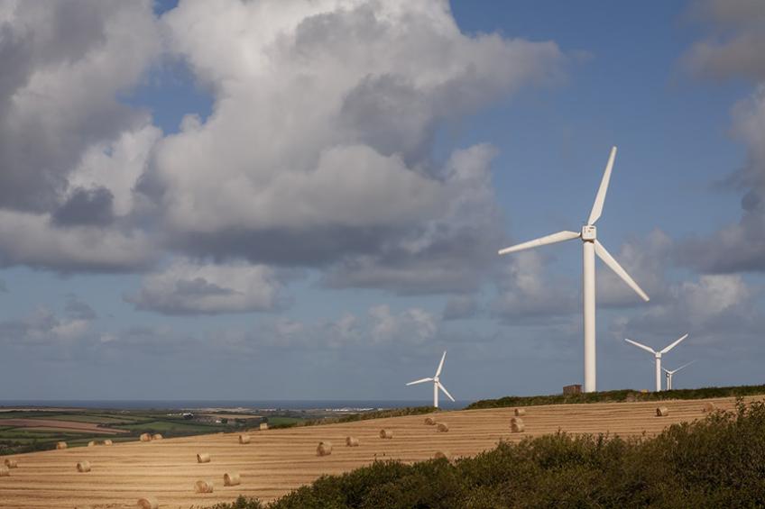 Windfarms producing green energy in the countryside