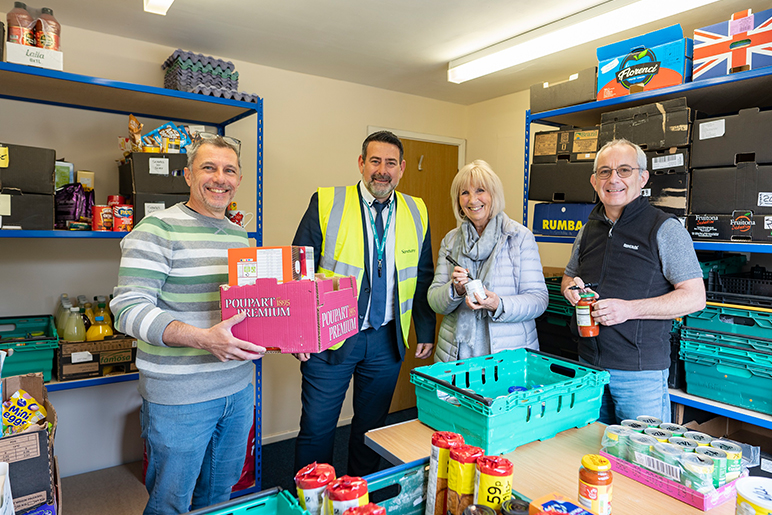 A image showing Gordon Hayes, Sanctuary's Tim Wray, Jenny Wray, Geoff Borgham at the food bank