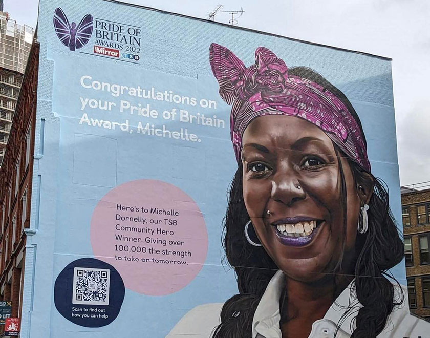 Children with Voices founder Michelle Dornelly is featured in a giant mural on Old Street. 