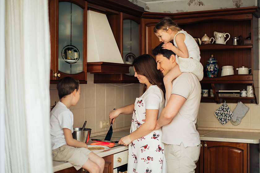 Young family cooking together at Sanctuary