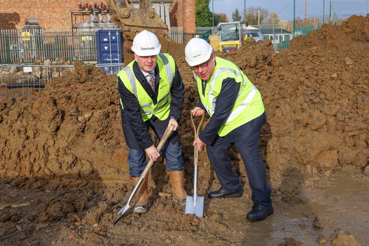 Rayleigh and Wickford MP Mark Francois and Craig Moule on the site of 100 new homes in Wickford wearing high vis and hard hats with spades digging into the ground