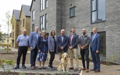 Mark Rowe - Assistant Site Manager, Lovell; Ross Field - Regional Managing Director, Lovell; Cllr. Hazel Foster; Claire Newcombe – Development Manager, Sanctuary; Steve Darling MP (with Jenny the dog); Matt Shaw - Operations Manager, Lovell; Sam Clarke - Site Manager, Lovell; Chris Cole - Development Director - England, Sanctuary standing in front needed new affordable homes for local people in Torquay.