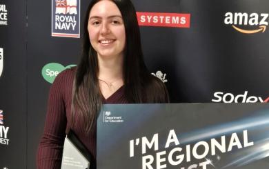 Regional finalist Katie at the awards ceremony holding her award