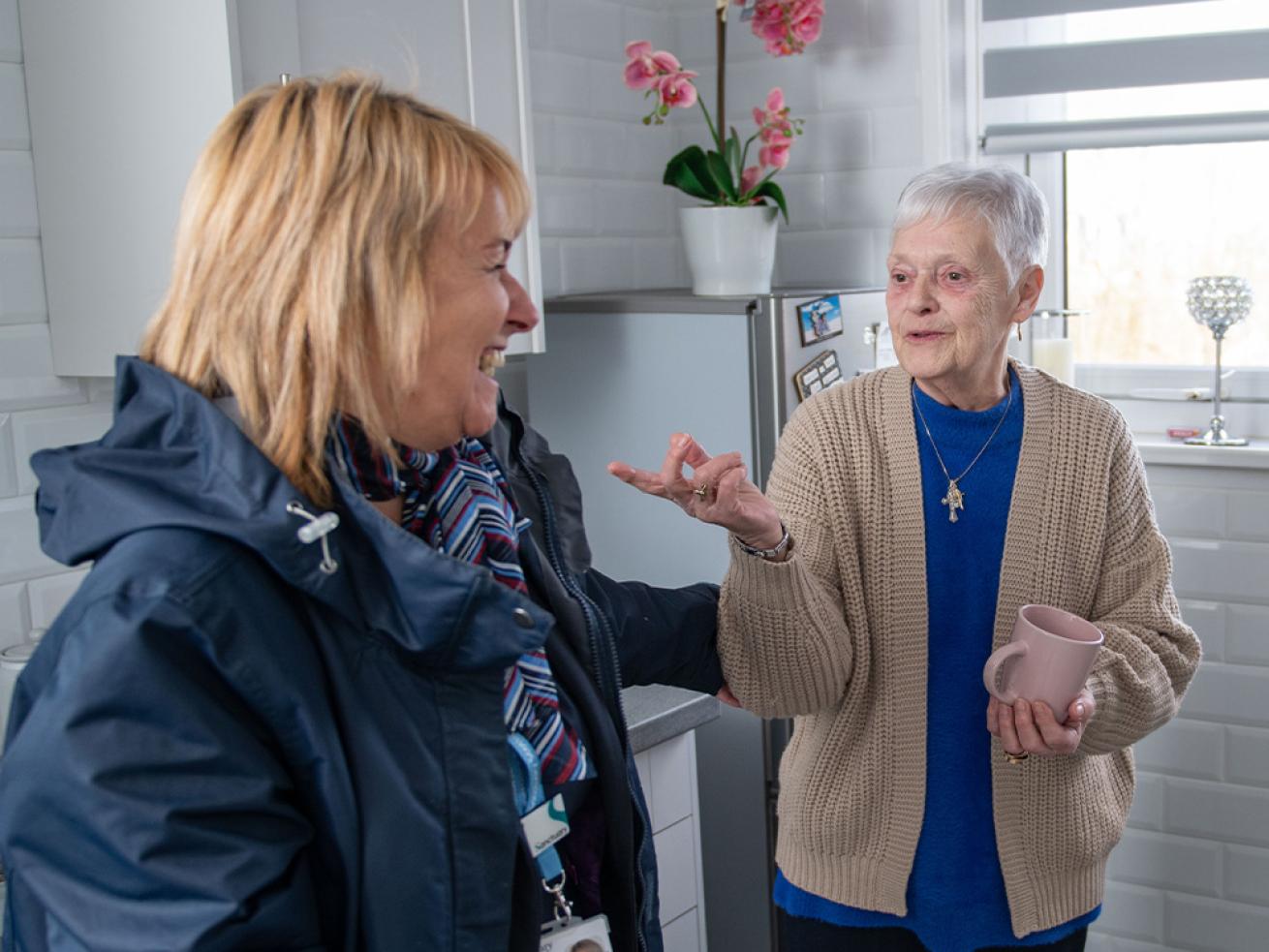 Resident and housing officer talking