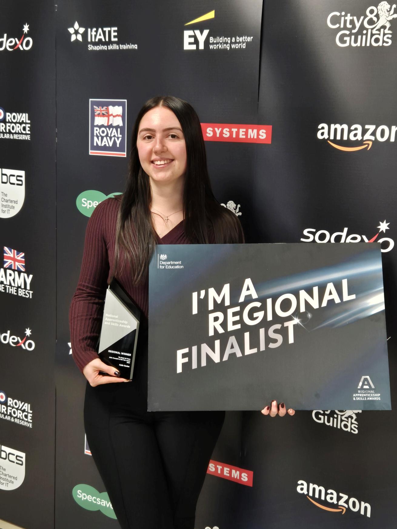 Regional finalist Katie at the awards ceremony holding her award