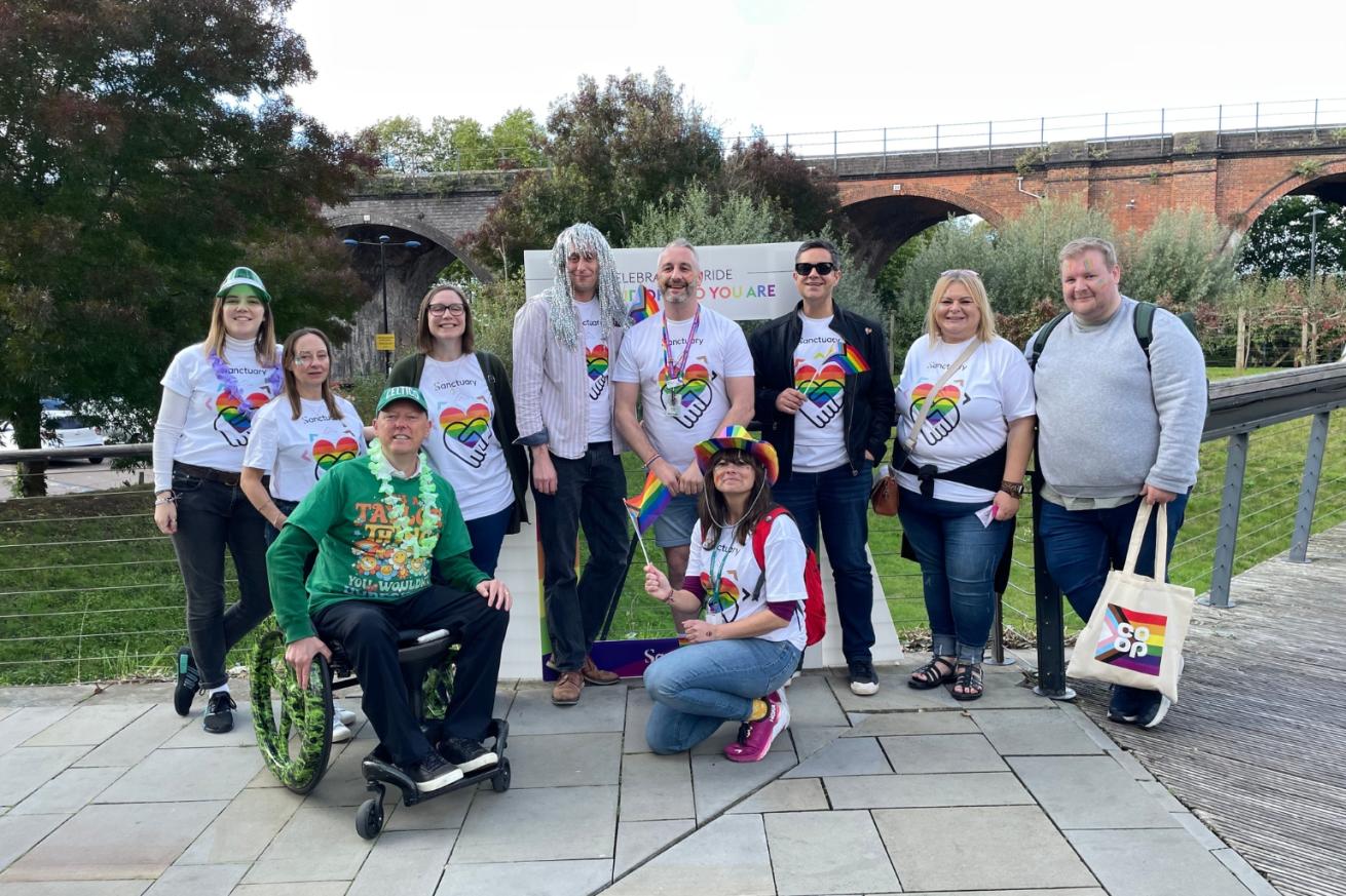 A group of employees of Sanctuary at Worcester Pride celebrations wearing Sanctuary branded Pride T-shirts