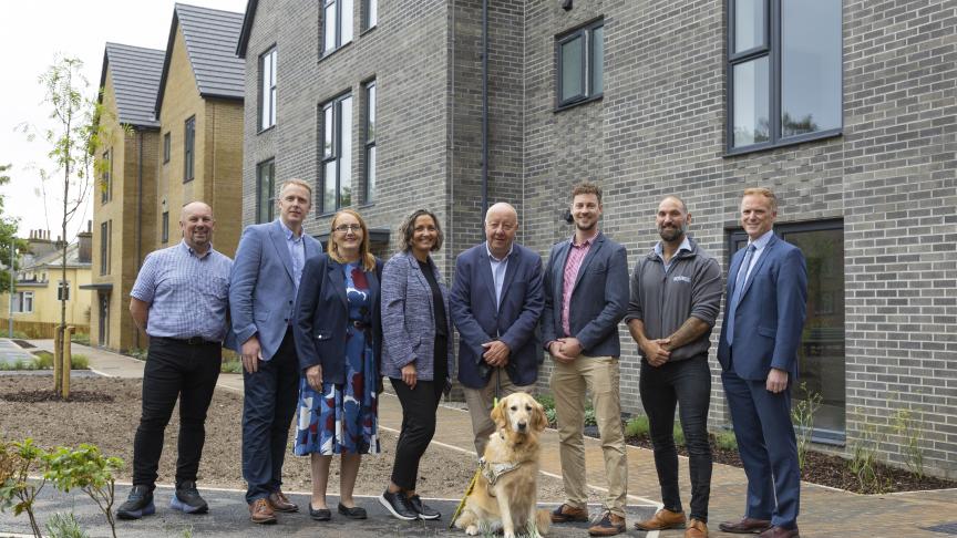 Mark Rowe - Assistant Site Manager, Lovell; Ross Field - Regional Managing Director, Lovell; Cllr. Hazel Foster; Claire Newcombe – Development Manager, Sanctuary; Steve Darling MP (with Jenny the dog); Matt Shaw - Operations Manager, Lovell; Sam Clarke - Site Manager, Lovell; Chris Cole - Development Director - England, Sanctuary standing in front needed new affordable homes for local people in Torquay.