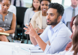 A panel of people having a discussion 